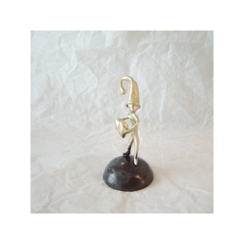 Brass elf holding a heart