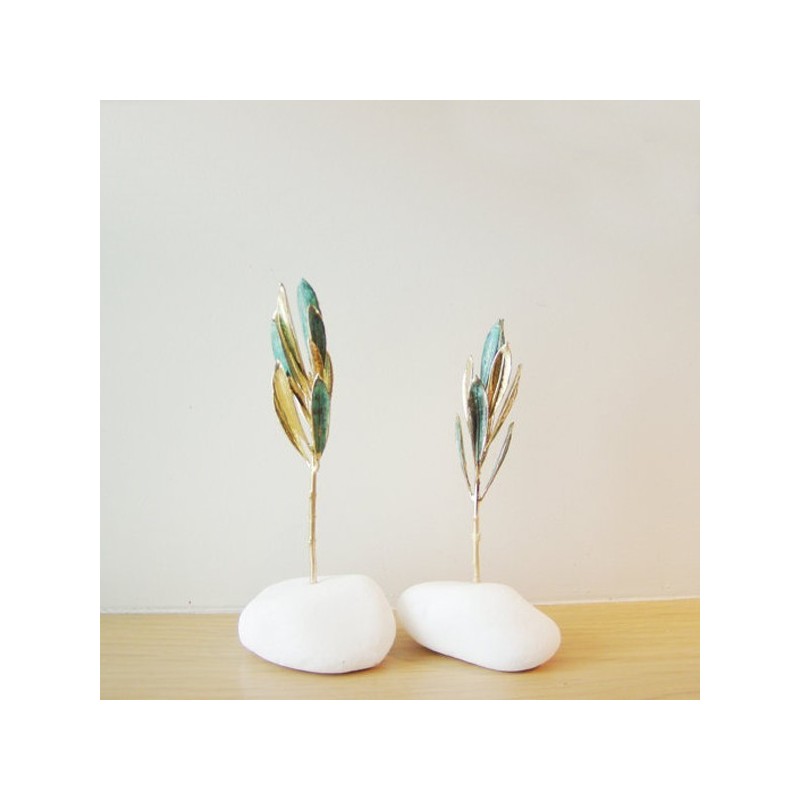 Real olive branch eco sculpture on white stone, real olive branch gold plated with 24 K gold