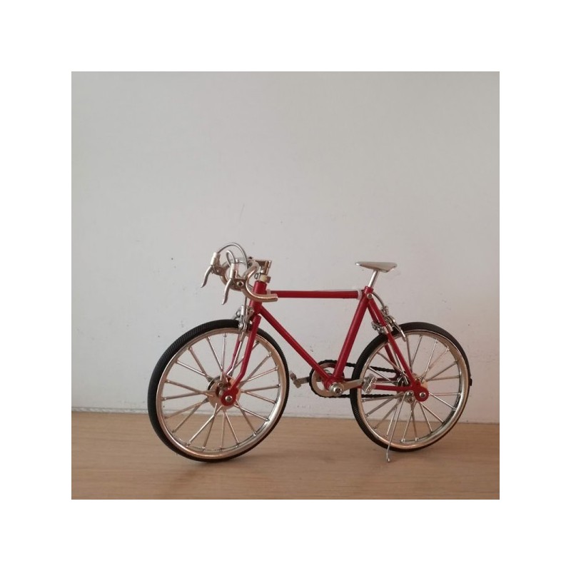 Bright red racing bike miniature