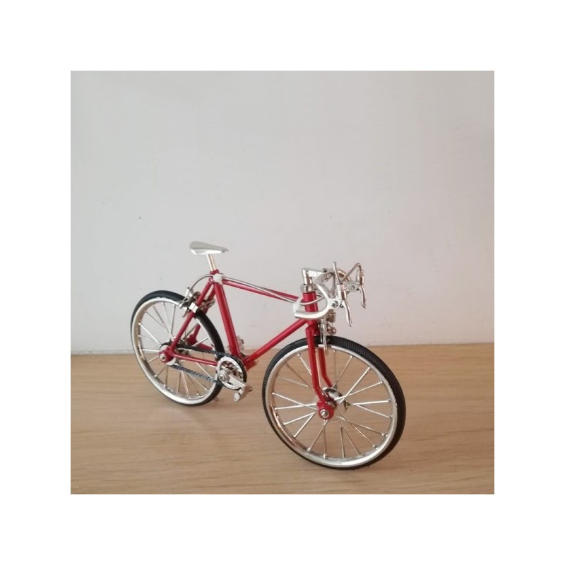Bright red racing bike miniature