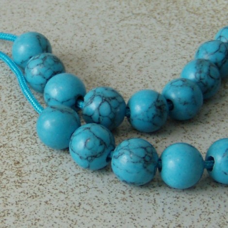 Turquoise and silver worry beads with blue cord 2