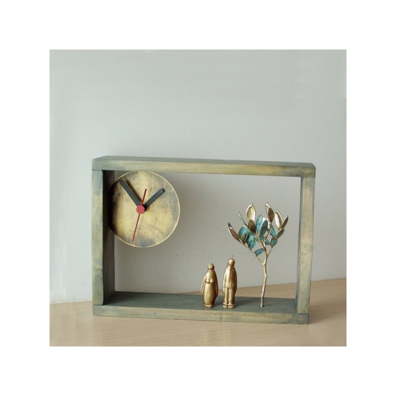 Man woman sculpture, wooden frame clock with brass dial, brass figures and electroplated schinus tree