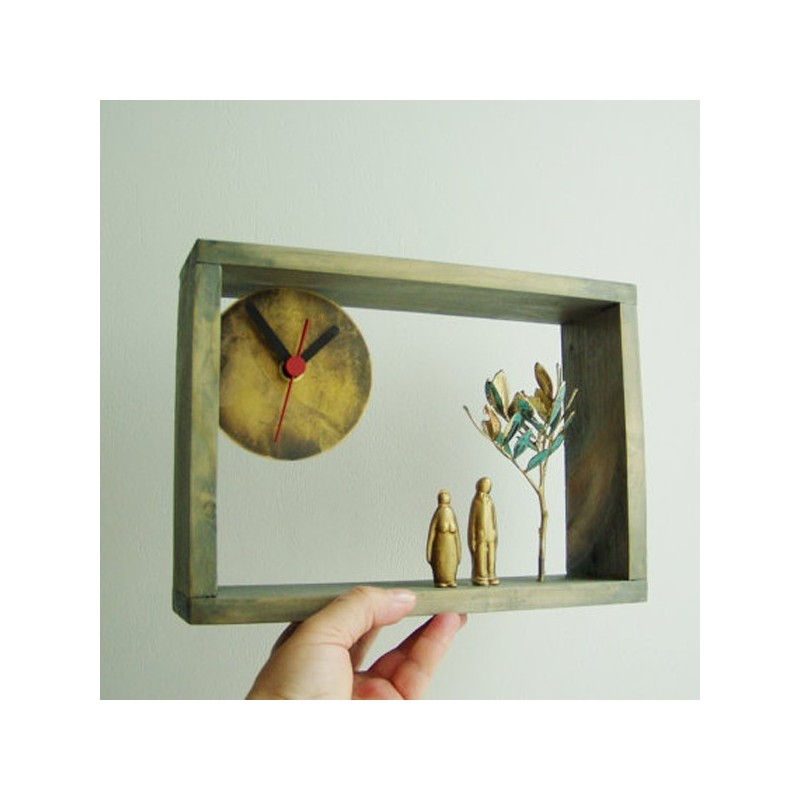 Man woman sculpture, wooden frame clock with brass dial, brass figures and electroplated schinus tree