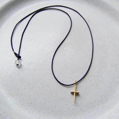 Modern gold cross, 18K designer made, solid gold cross of minimal design on a black cord 2