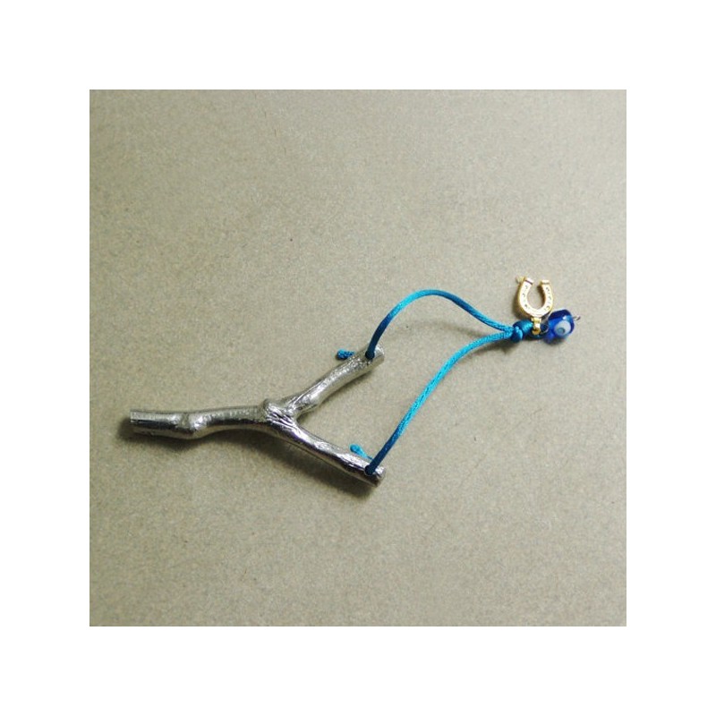 Aluminum slingshot with turquoise cord, blue eye and horseshoe charms, silver slingshot sculpture
