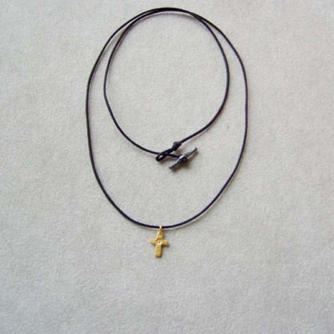 Gold cross necklace, tiny solid 18K gold cross with textured surface on a black cord 2