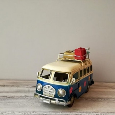 Retro VW van, hippie van in navy blue and creamy white with painted flowers and surfboards on the baggage rack 2