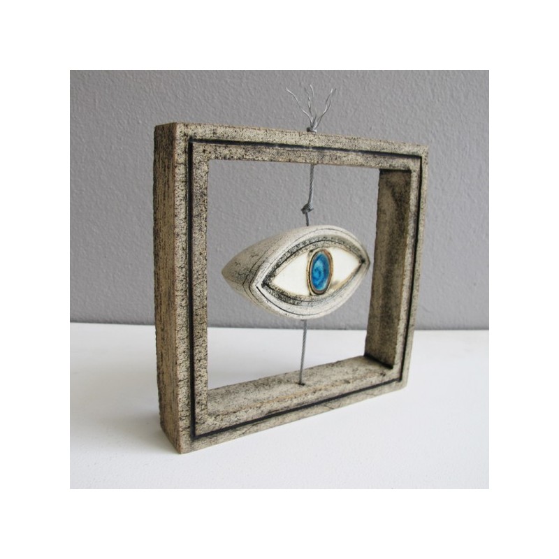 Eye ceramic sculpture in ceramic frame