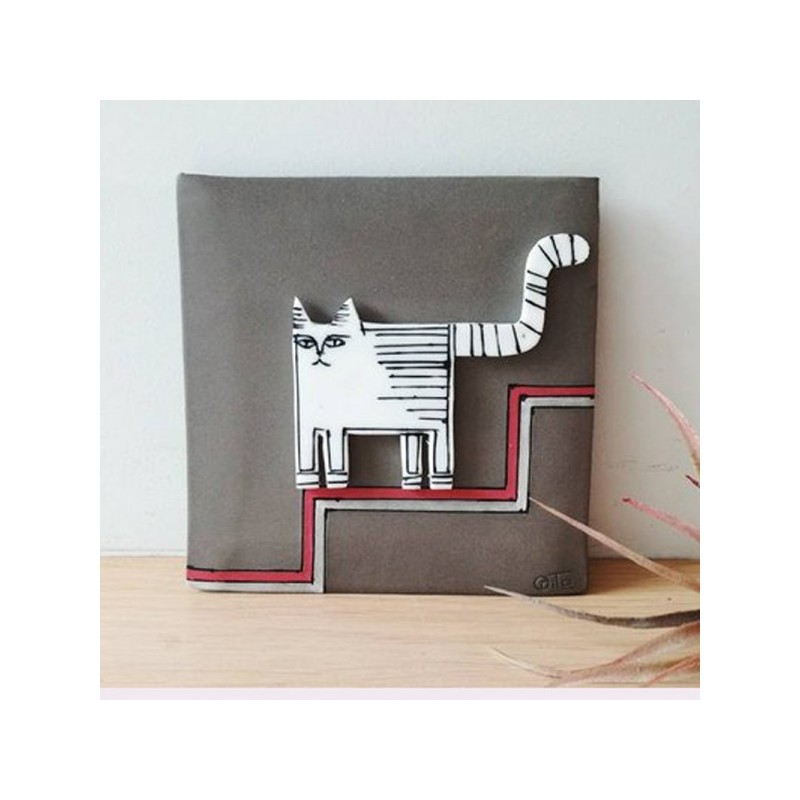 White cat wall hanging, porcelain cat in grey background, square wall tile of stoneware and porcelain