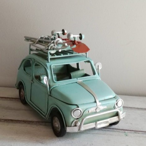 Blue Fiat car miniature with roller skates, retro collectible miniature Fiat 500 with roller skates and skis on the top 2
