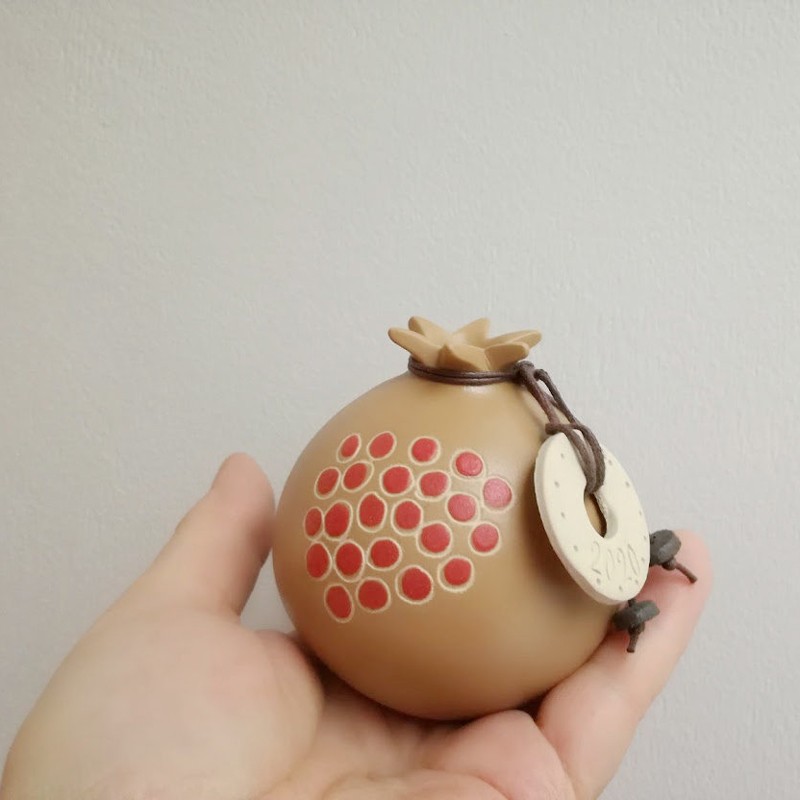 Ceramic pomegranate ornament with 2022