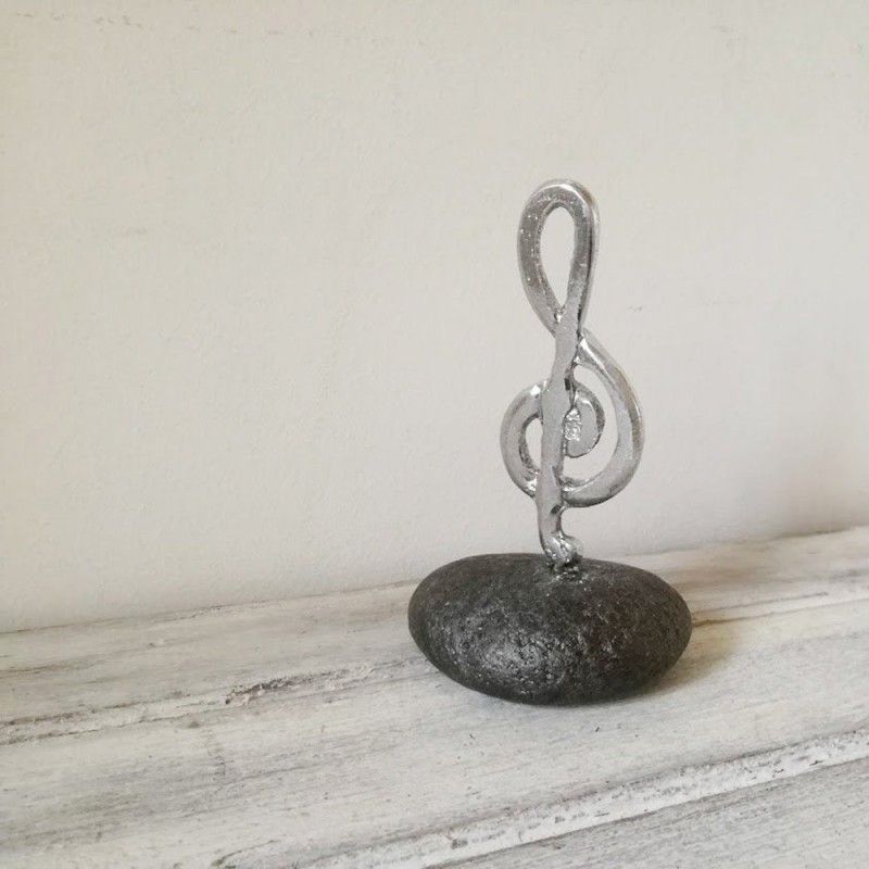 Treble clef sculpture, silver treble clef on black stone, treble clef