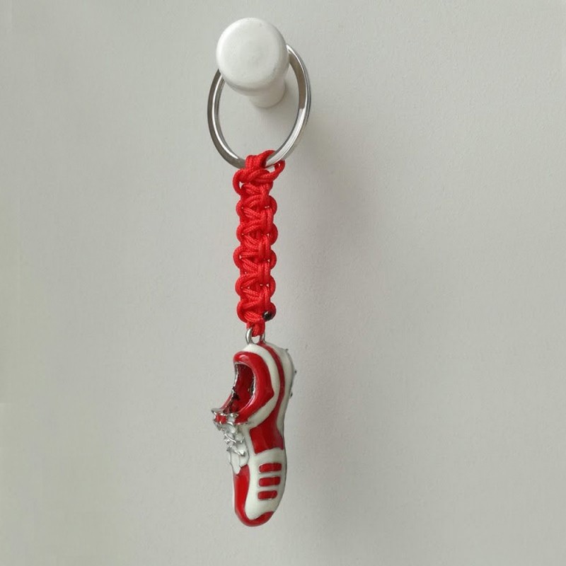 Football shoe keyring, red and white...