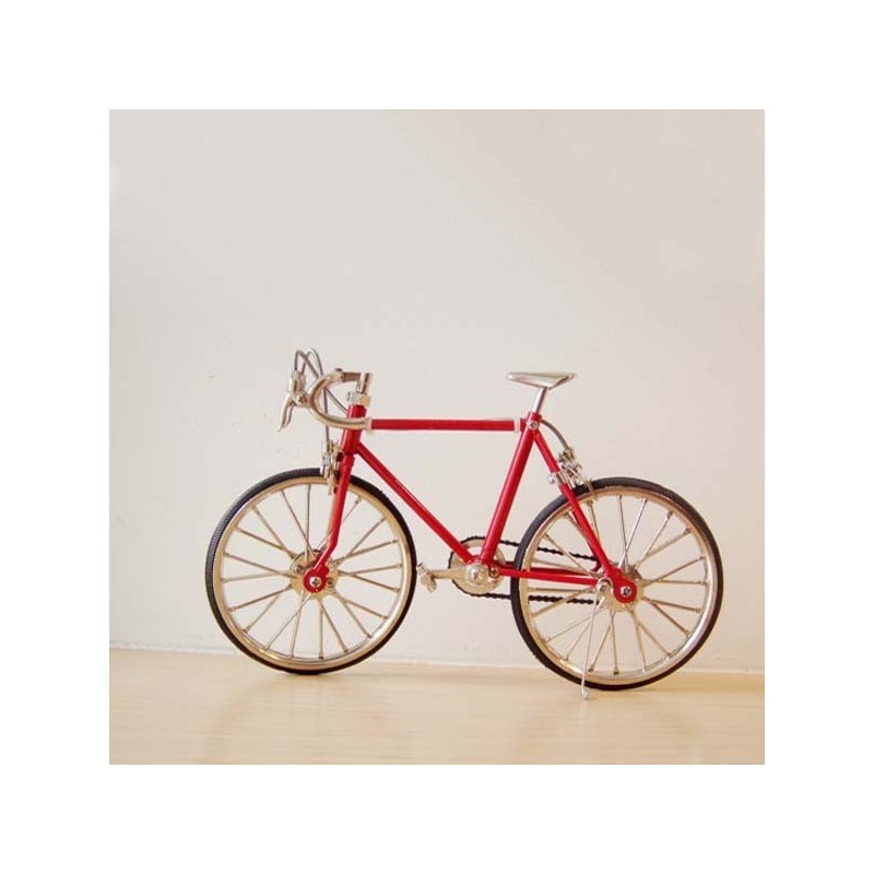 Bright red racing bike miniature