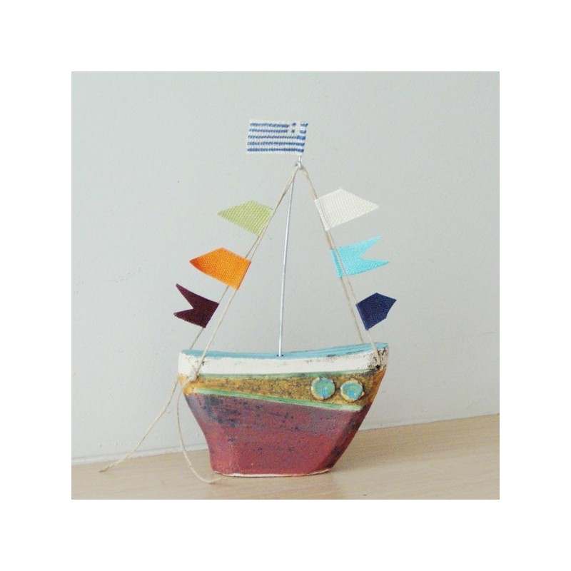 Ceramic sailing boat with colourful...