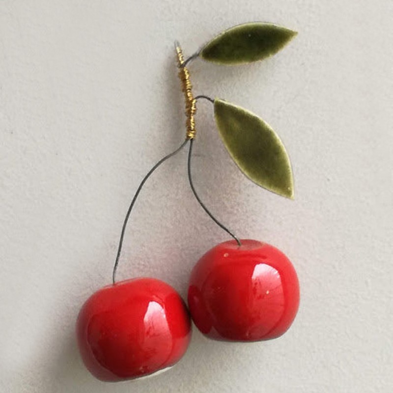 Red cherries sculpture, two cherries...