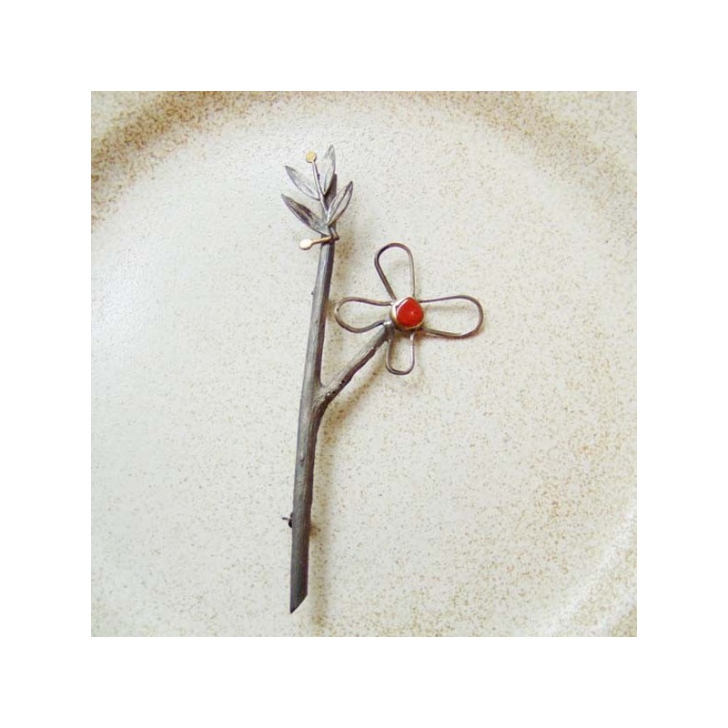 Twig and flower brooch of silver and...