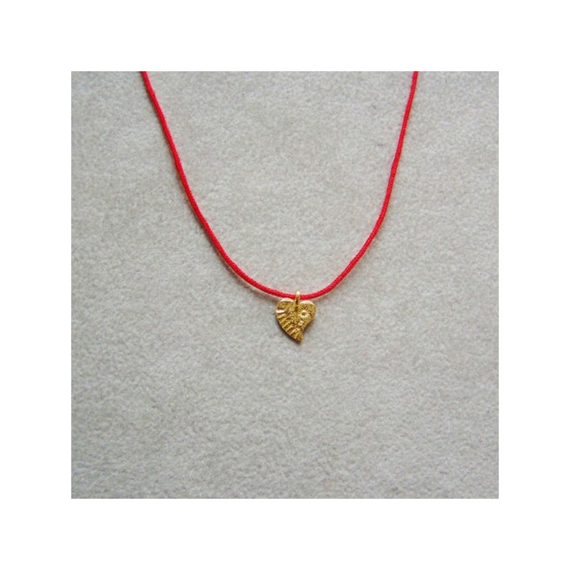 Solid gold heart necklace.
