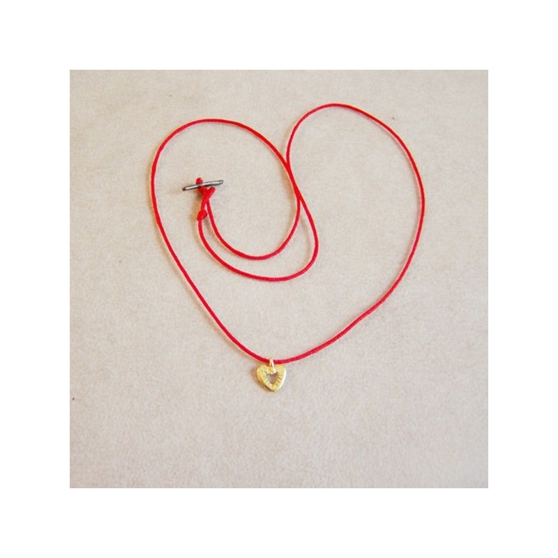 Tiny gold heart pendant on red cord, solid 18 k gold heart.