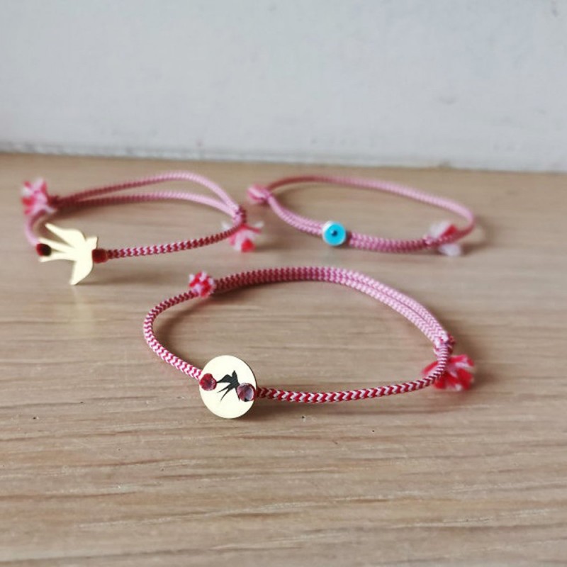 March gold bracelet, red white bracelet with various charms