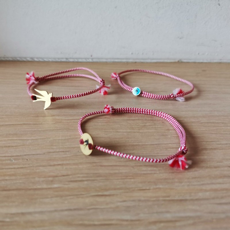 March gold bracelet, red white bracelet with various charms