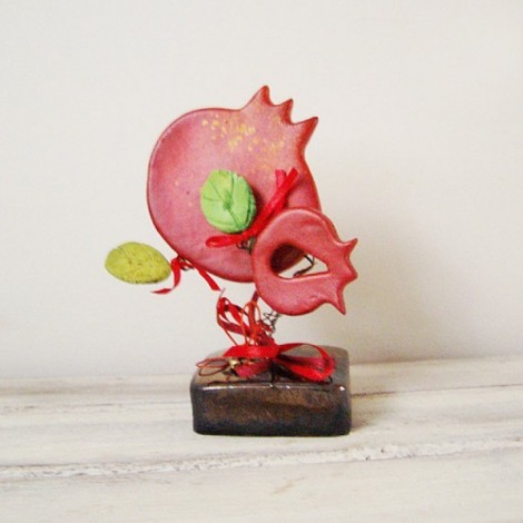 Red pomegranates sculpture,...