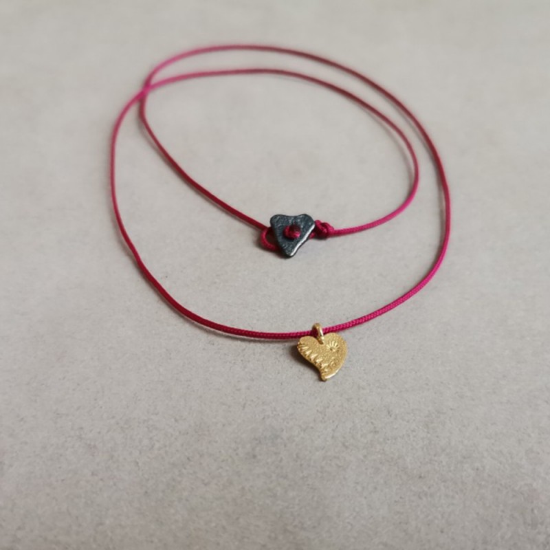 Solid gold heart necklace.