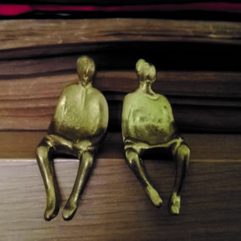 Seated couple figures, brass sculptures of a man and a woman 2