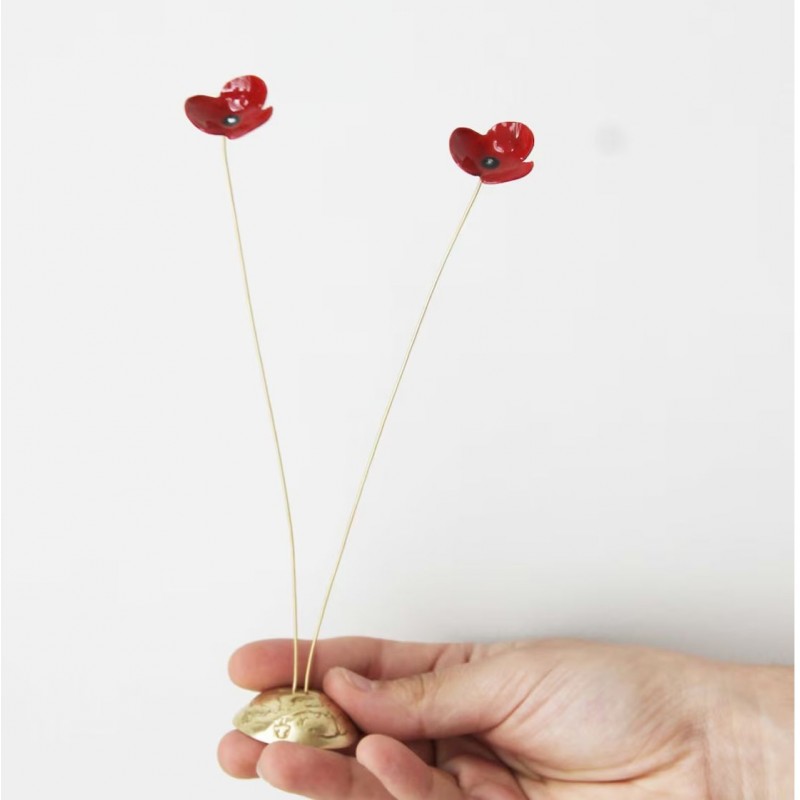 Red poppies metal sculpture