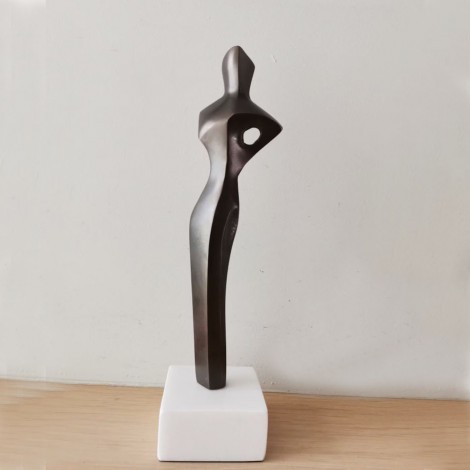 Abstract figure sculpture, solid brass, brute minimalist aesthetic, oxidised brass woman figure on marble 2
