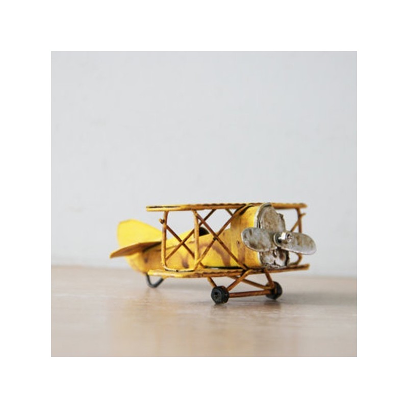 Yellow miniature aeroplane, tiny...
