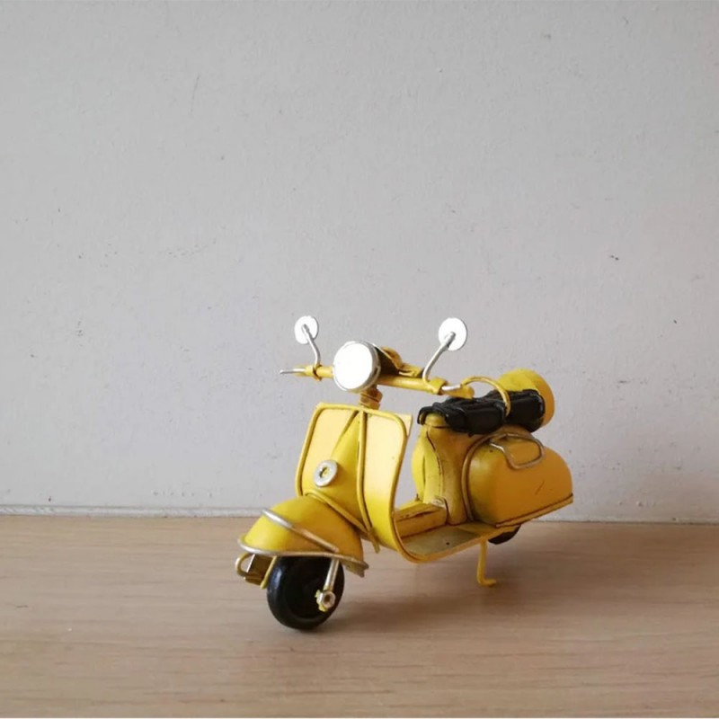 Metal scooter miniature in yellow