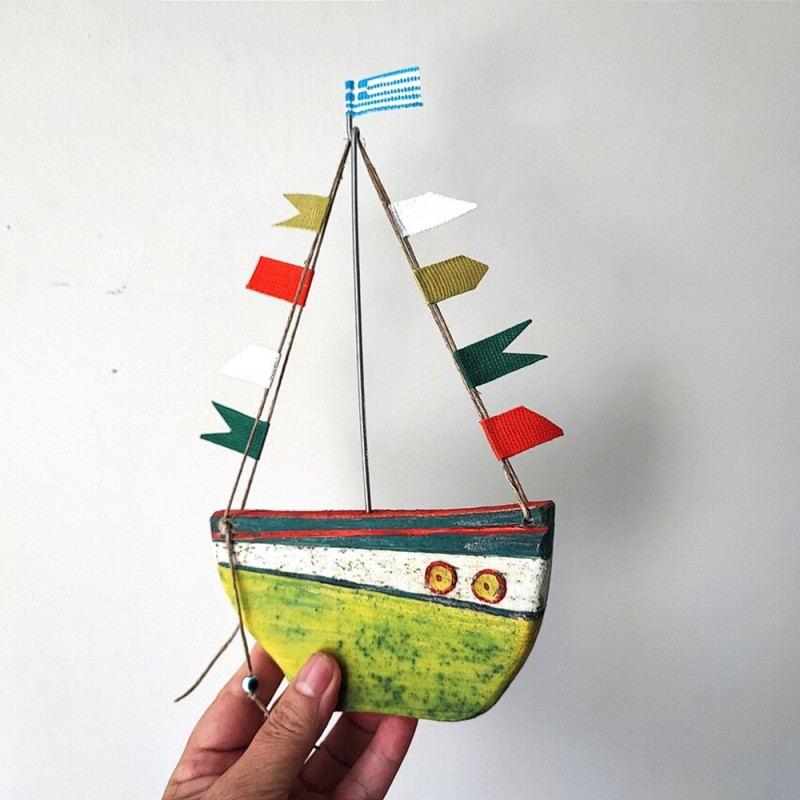 Yellow boat wall hanging