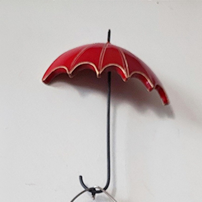 Porcelain figure with umbrella, 50x15 cm.