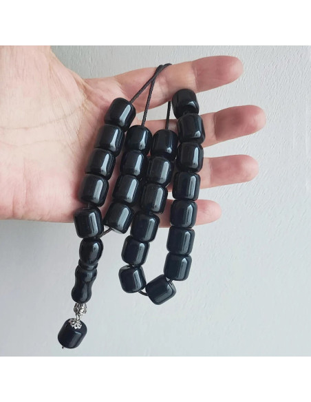 Black bakelite worry beads, traditional Greek komboloi with cylindrical black beads, typical black mala beads, prayer beads
