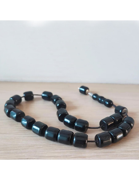 Black bakelite worry beads, traditional Greek komboloi with cylindrical black beads, typical black mala beads, prayer beads