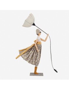 Wooden table lamp is lamp of a girl carrying an umbrella