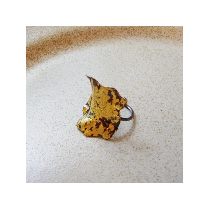 Black and gold square ring uneven...