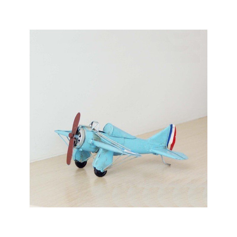 Turquoise miniature aeroplane