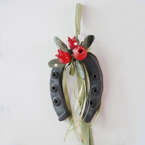 Black horse shoe with red...
