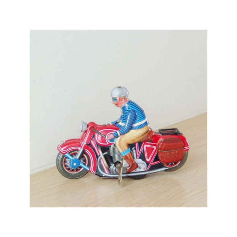 Wind up biker toy of a vintage, red...