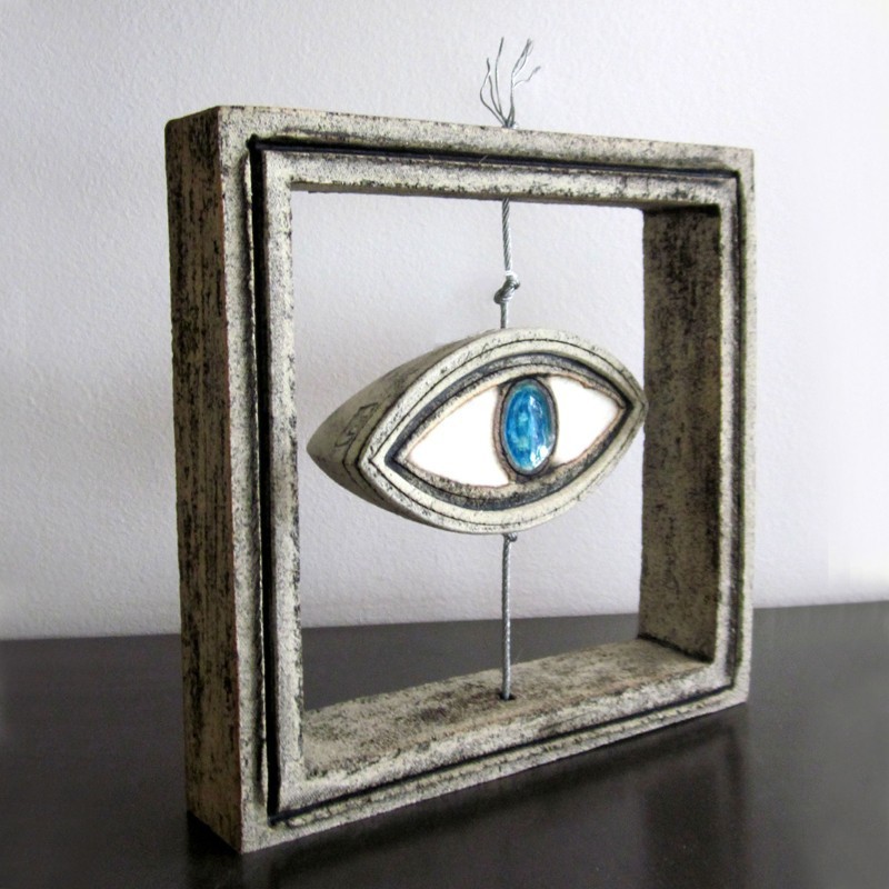 Eye ceramic sculpture in ceramic frame