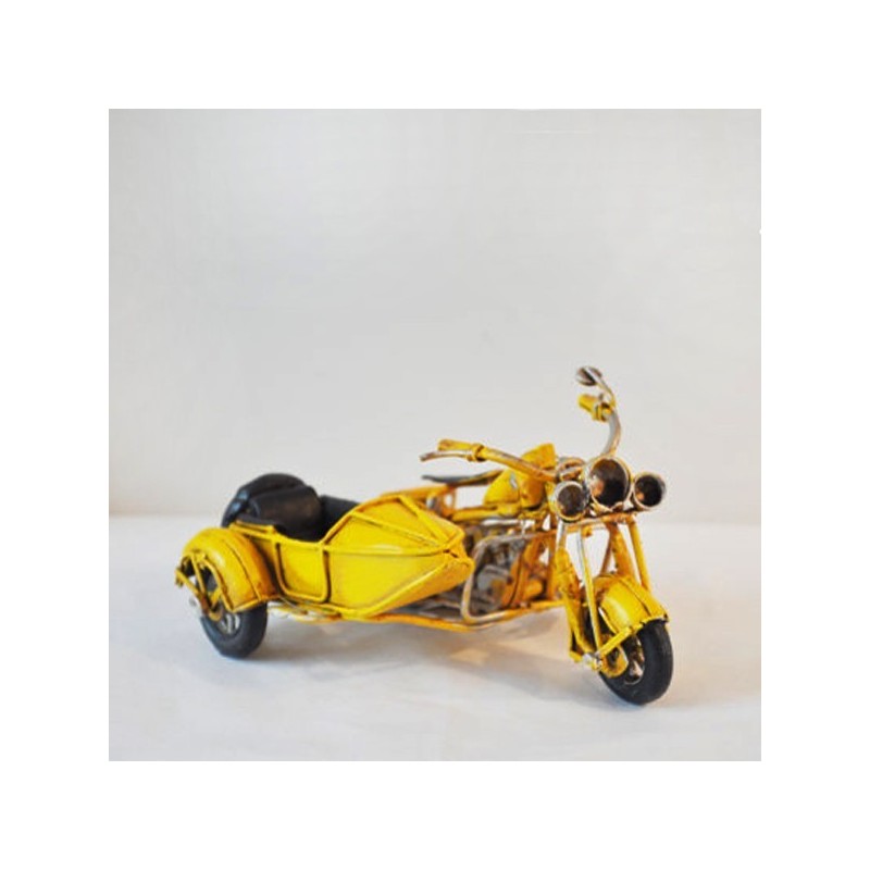 Yellow , metal, miniature retro bike with a side car
