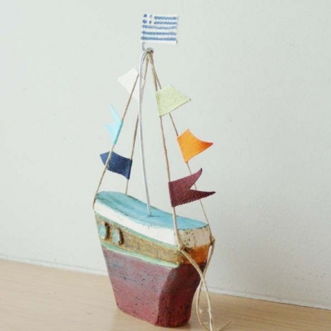 Ceramic sailing boat with colourful flags 2