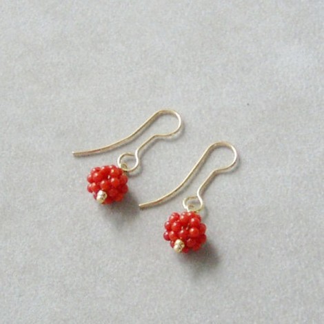 Dangle coral and gold earrings. 2