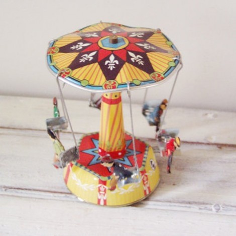 Colourful carousel miniature, tin, merry go round toy with six seated figures, carrousel in red yellow blue 2
