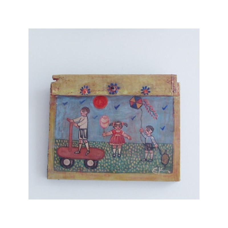 Kids at play painting on reclaimed wood